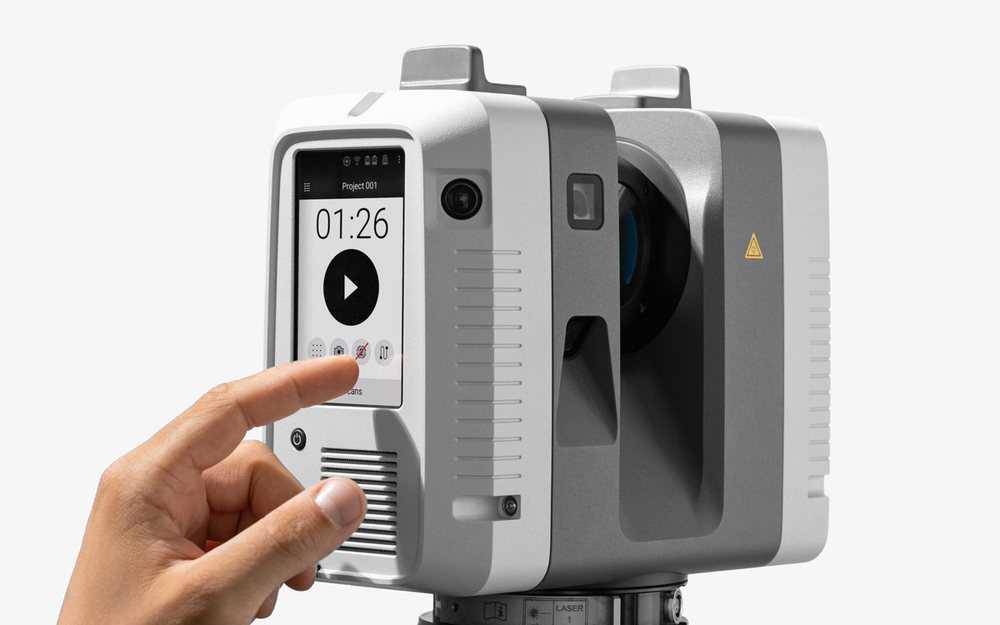 An Artec Ray II long-range 3D scanner on a tripod